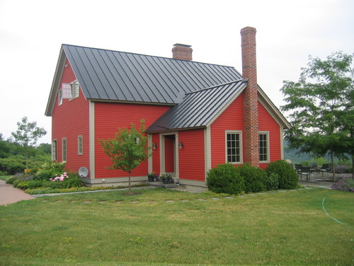 cómo elegir el color del techo para la casa de ladrillo rojo